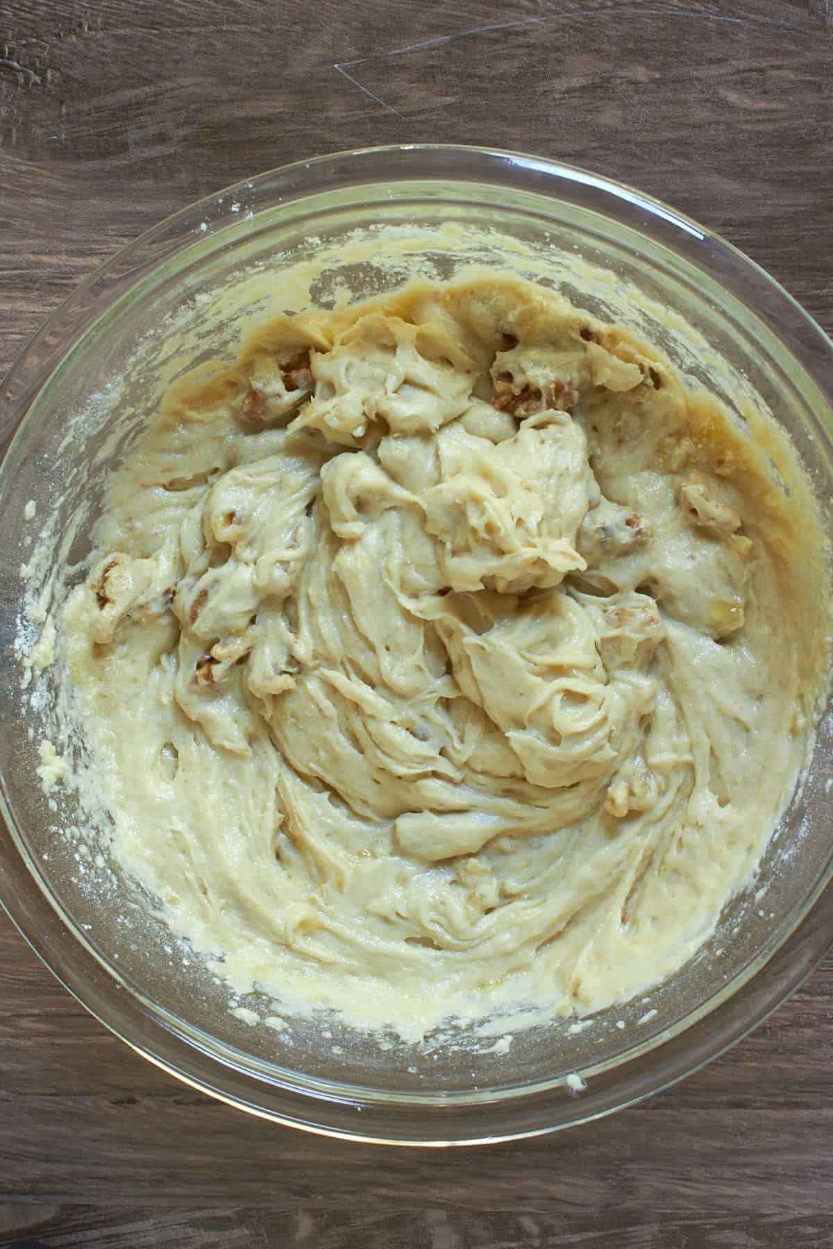 thickened batter with walnut pieces throughout.